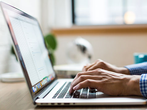 person-typing-on-laptop